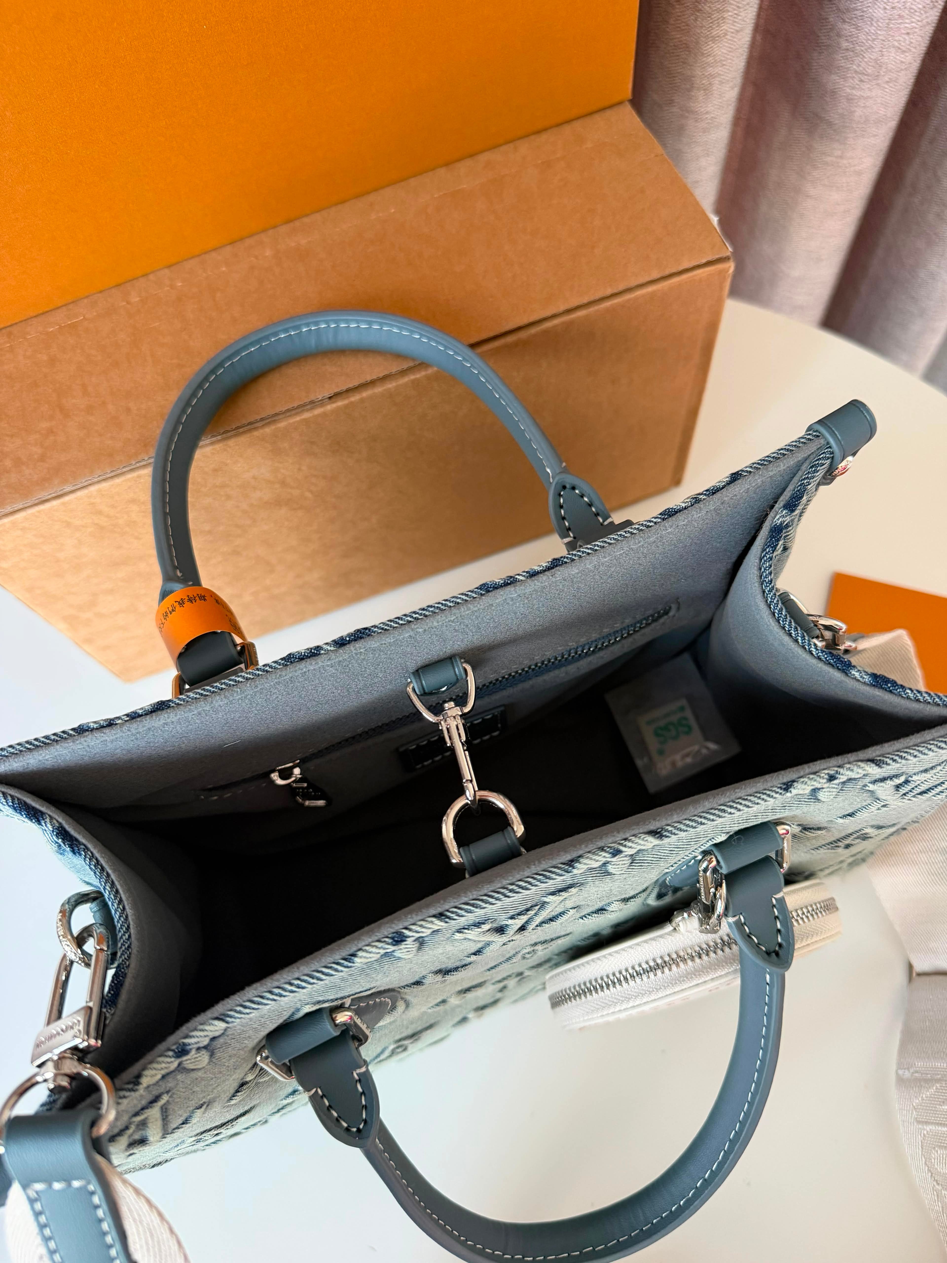 Louis Vuitton On The Go Denim bag