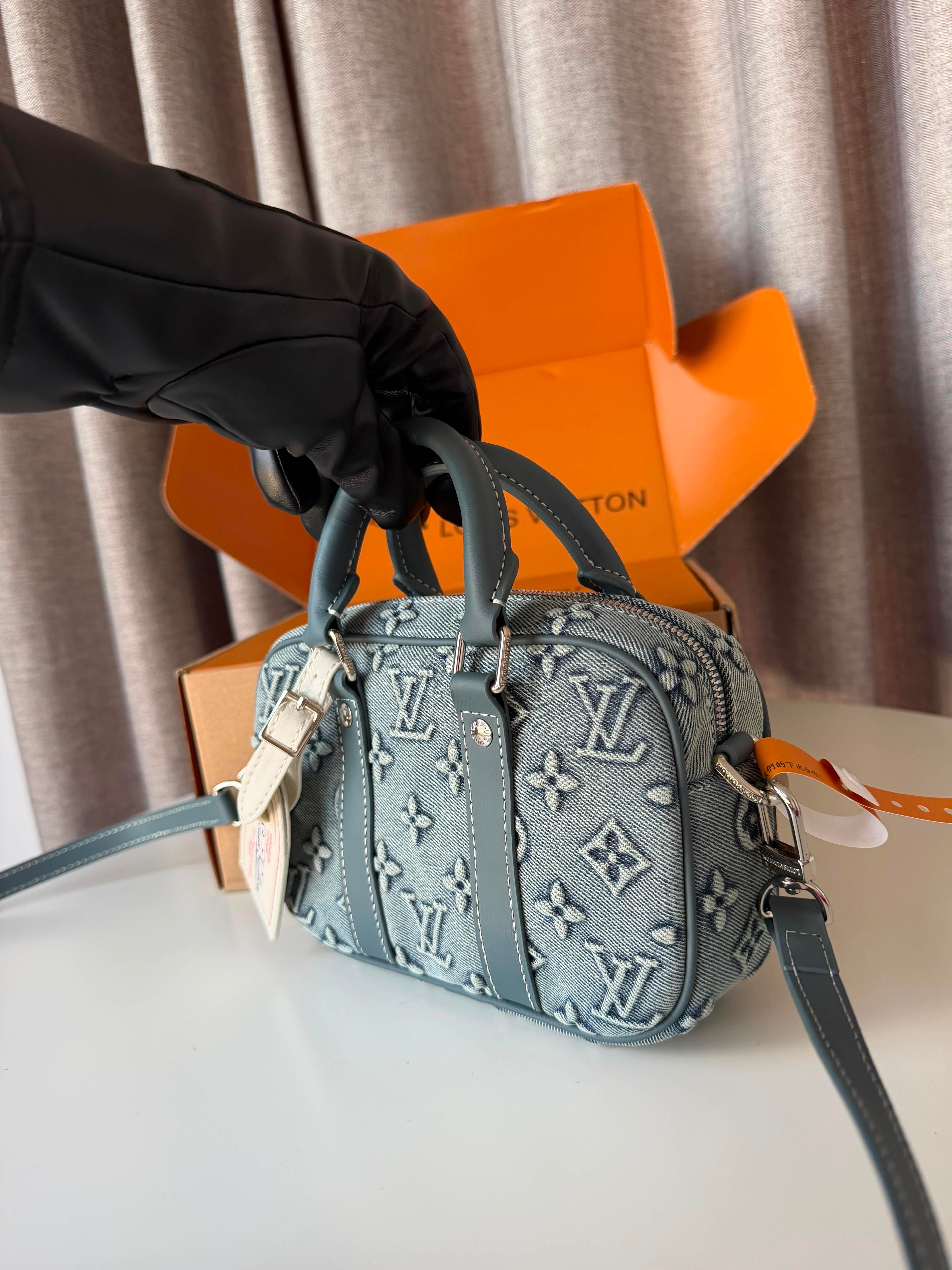 Louis Vuitton Top-handle Denim bag